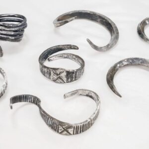 ‘Spectacular silver treasure’ from Viking Age unearthed by college student on farm in Denmark