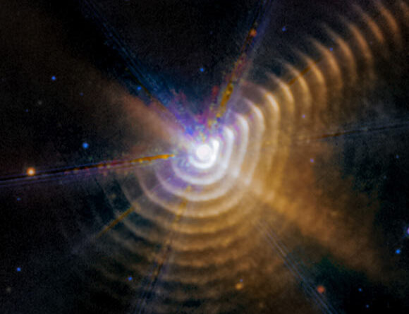 Webb Spots Shells of Carbon-Rich Dust around Wolf-Rayet 140