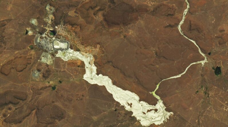 Earth from space: Golden river of toxic waste spills out from deadly mining disaster in South Africa