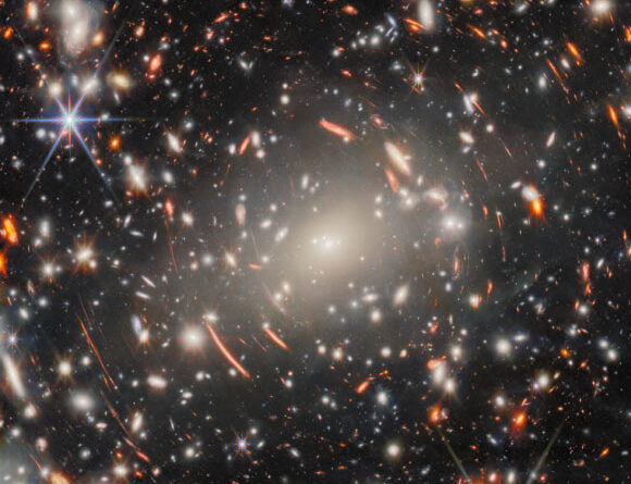 Webb Focuses on Behemoth Galaxy Cluster: Abell S1063