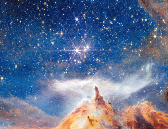 Webb Spots Cluster of Young Massive Stars in Lobster Nebula