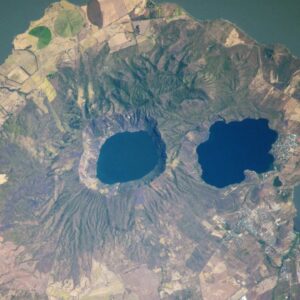 Volcanic ‘googly eyes’ stare into space from skull-like peninsula — Earth from space