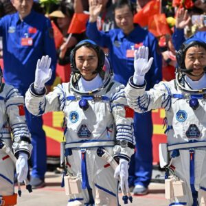Three Chinese astronauts stranded in space after debris hits their return capsule