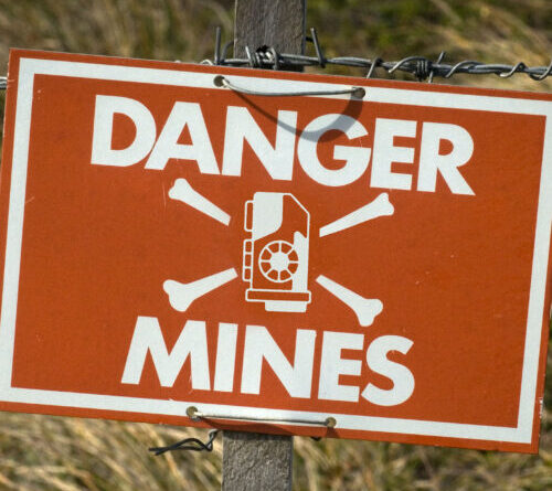 We asked four AI coding agents to rebuild Minesweeper—the results were explosive