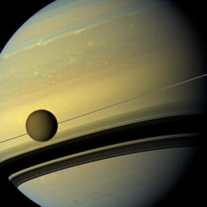 Saturn’s Ring System, Hyperion and Titan May Have Originated in Collision of Two Proto-Moons