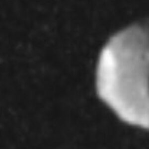 Juno Snaps Rare Close-Up of Jupiter’s Shadowy Moon Thebe