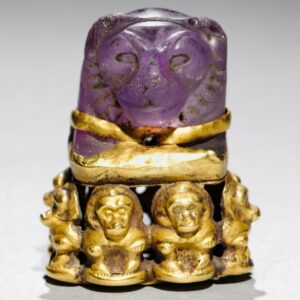 Lion’s head pendant: An ancient Egyptian board game piece that was later repurposed into a magical religious object with baboons
