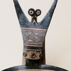 Daunian kyathos: A 2,700-year-old ceramic cup from Italy decorated with an exuberant-looking, bug-eyed fellow