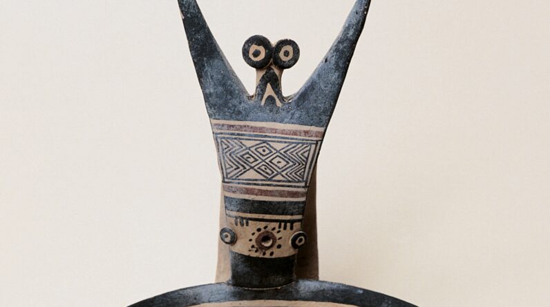 Daunian kyathos: A 2,700-year-old ceramic cup from Italy decorated with an exuberant-looking, bug-eyed fellow
