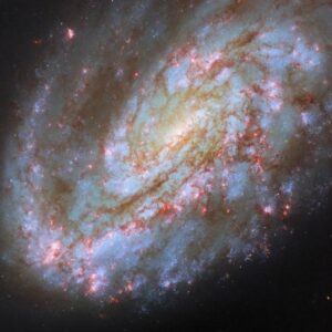 Hubble Spots Spiral Galaxy Warped by Cosmic Forces