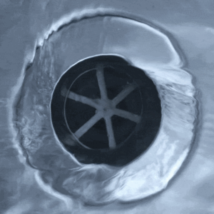 Does water drain in different directions in the Northern and Southern hemispheres?