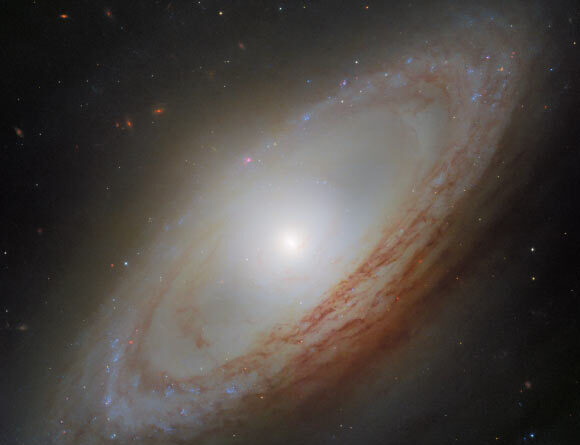 Hubble Spots Spiral Galaxy Rotating Out of Sync with Itself